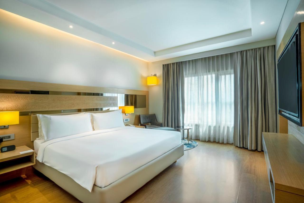 Holiday Inn Agra Mg Road An Ihg Hotel Exterior foto A room at the hotel